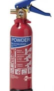 Red powder fire extinguisher with blue handle, essential for boat safety and emergency preparedness on the water.