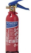 Red powder fire extinguisher with blue handle, essential for boat safety and emergency preparedness on the water.