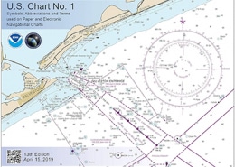 U.S. nautical chart featuring symbols, terms, and navigational routes for powerboating. 13th edition, April 15, 2019.