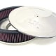 High-performance round air filter with chrome top, ideal for enhancing engine efficiency in powerboats.