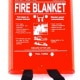 Red fire blanket container with safety instructions, essential for powerboat safety and emergency preparedness.