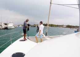 People preparing a powerboat at the marina, ready for a day of adventure on the water.