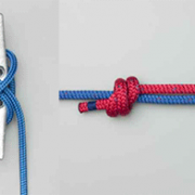 Red and blue boating ropes tied in various essential knots, perfect for secure docking and sailing efficiency.