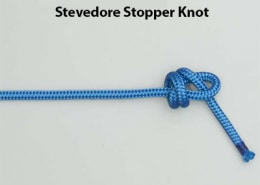 Blue rope tied with a Stevedore Stopper Knot, a reliable knot for securing lines in powerboating and sailing.