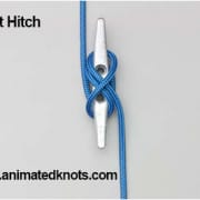 Cleat hitch knot on a silver cleat with blue rope, essential for powerboating safety and docking. Learn at animatedknots.com.